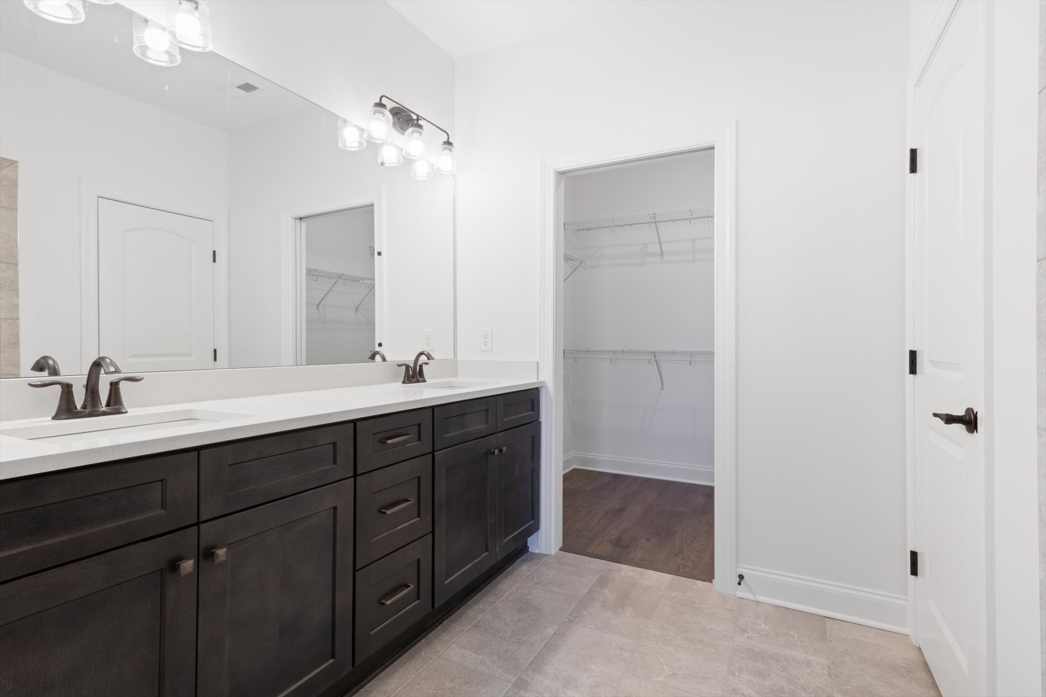 489 West Foxrun Springfield, TN 37172 - Photo 9 of 20 a bathroom with a double vanity sink and mirror