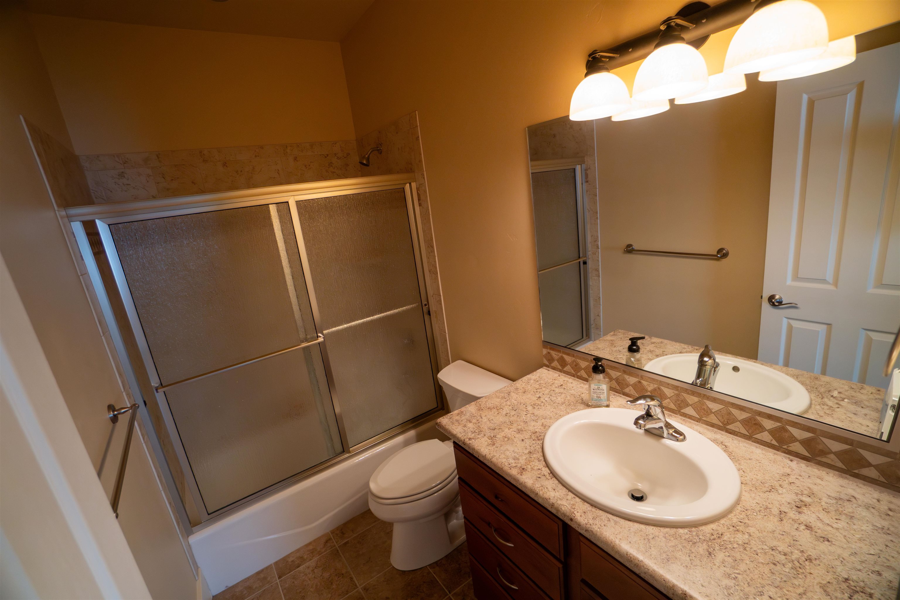 1111 Daisy Lane, Unit 32 Fruita, CO 81521 - Photo 18 of 23 a bathroom with a sink toilet and shower