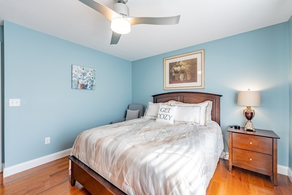 308 Miller Street, Unit 79 Ludlow, MA 01056 - Photo 14 of 20 a bedroom with a bed and a window