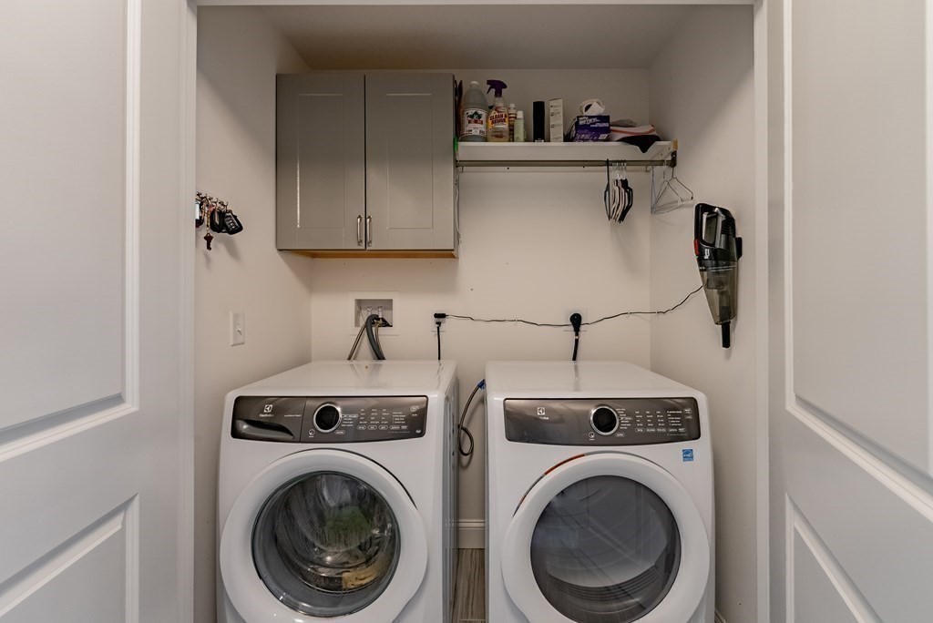 308 Miller Street, Unit 79 Ludlow, MA 01056 - Photo 19 of 20 a utility room with dryer and washer