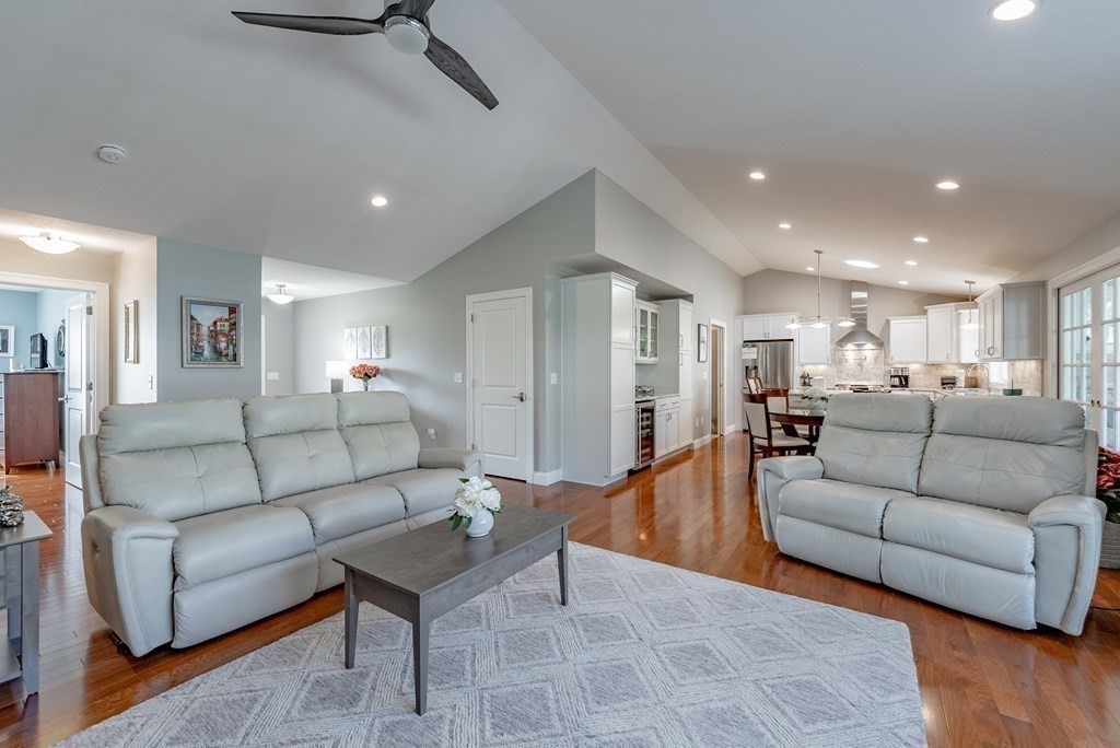 308 Miller Street, Unit 79 Ludlow, MA 01056 - Photo 8 of 20 a living room with furniture and a wooden floor