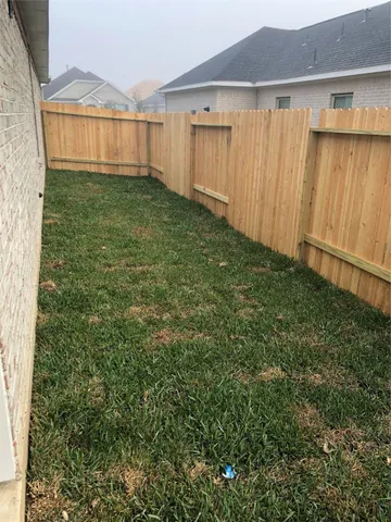 a view of a backyard with a garden