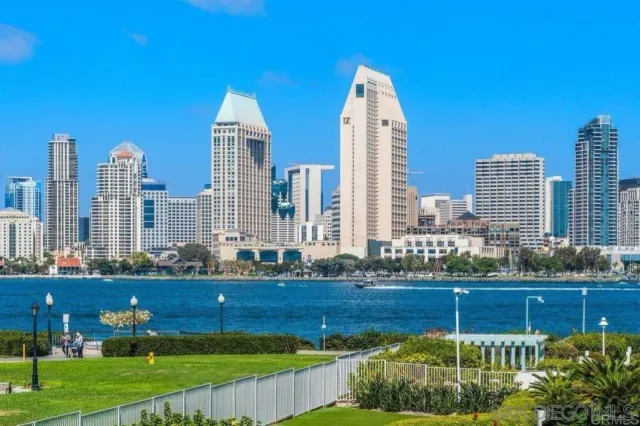 a view of a city with tall buildings