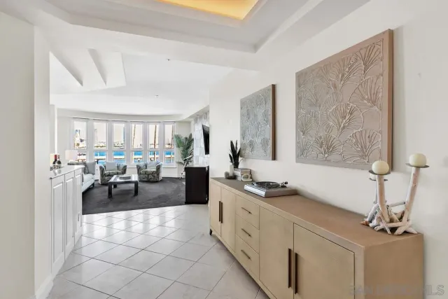 a view of a city from a dining room with furniture window and outside view