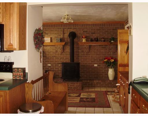 473 Hebron Road Imperial, PA 15126 - Photo 6 of 17 Exterior Front. Hearth Room with Wood Burner; Hearth Room is adjacent to Laundry Roo.m