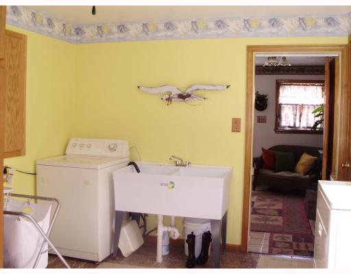 473 Hebron Road Imperial, PA 15126 - Photo 10 of 17 Exterior Front. Cheerful, Bright Laundry Room adjacent to Hearth Room; Laundry is set up for dual electric dryers.