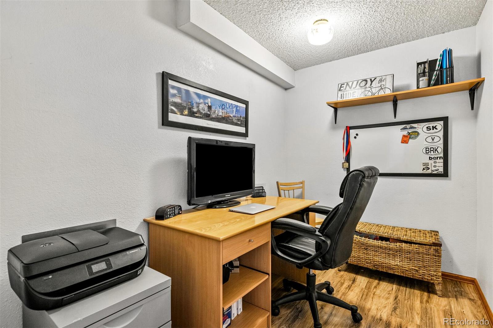 7670 Jared Way Littleton, CO 80125 - Photo 23 of 34 a room with furniture and air hockey table