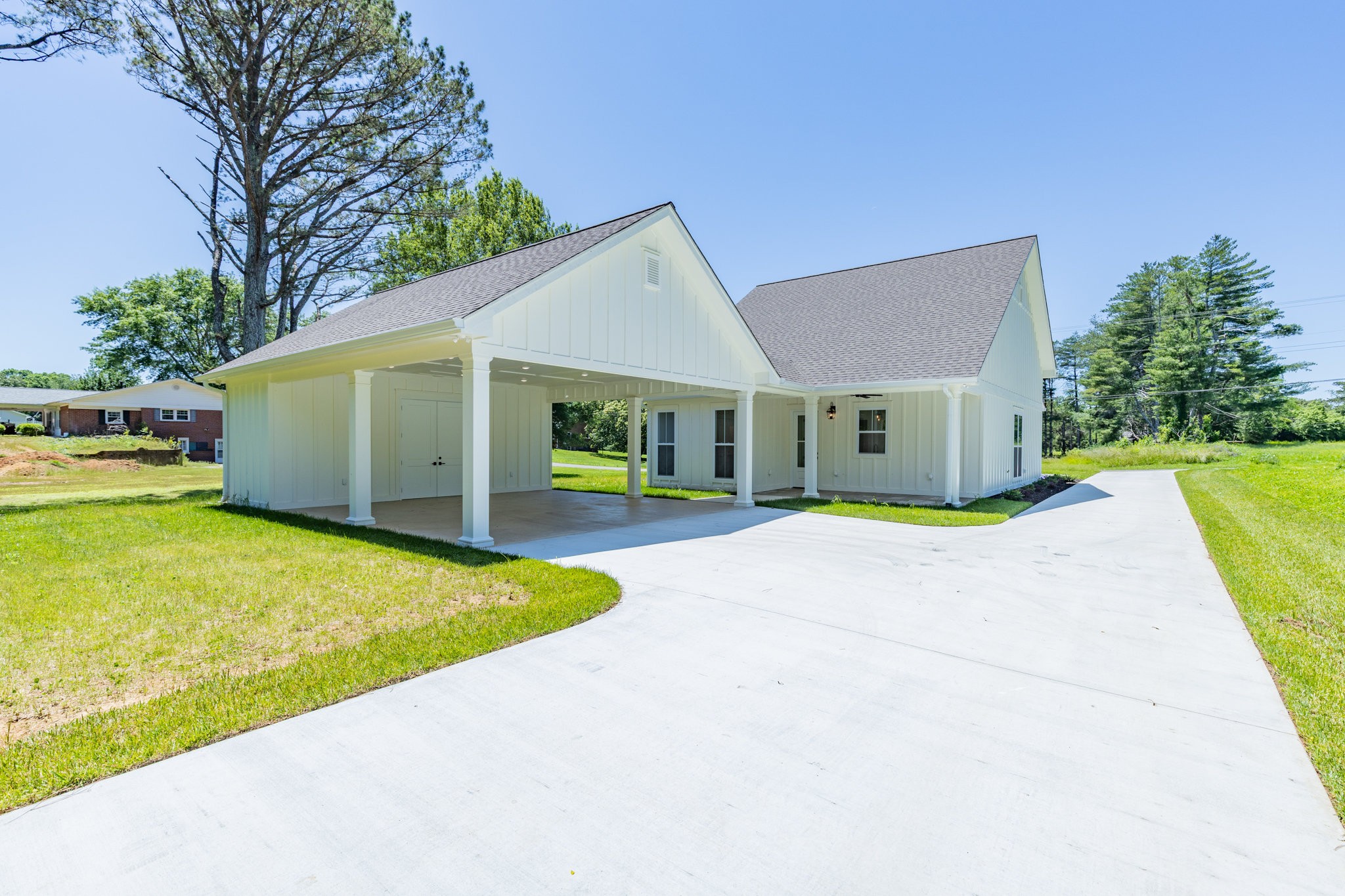 110 4th Avenue Loretto, TN 38469 - Photo 32 of 32 a house with swimming pool in front of it