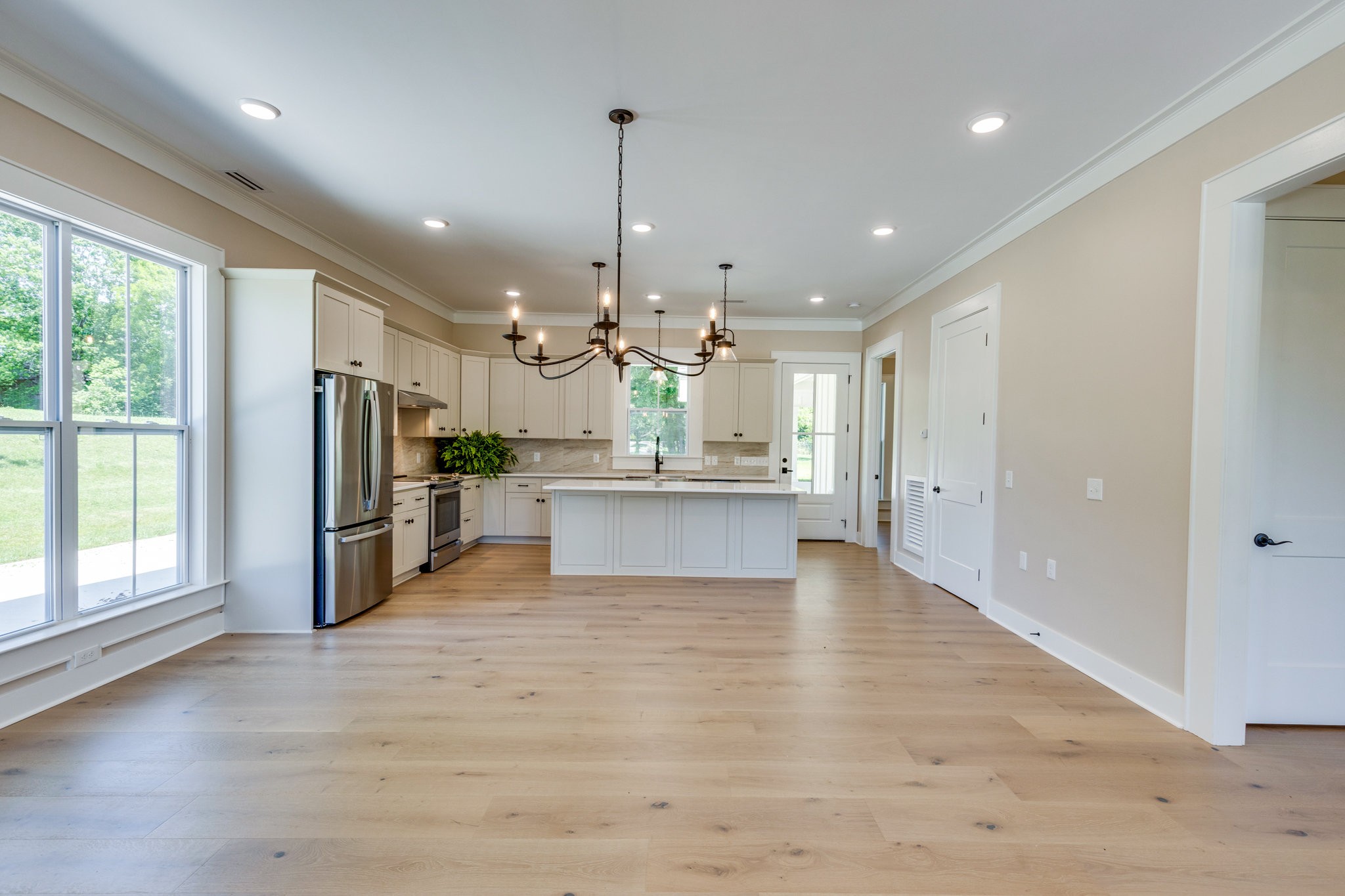 110 4th Avenue Loretto, TN 38469 - Photo 10 of 32 a view of a kitchen with refrigerator and microwave