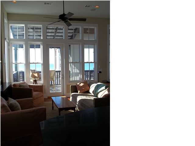 263 Winston Lane Inlet Beach, FL 32461 - Photo 2 of 21 a living room with furniture and a floor to ceiling window