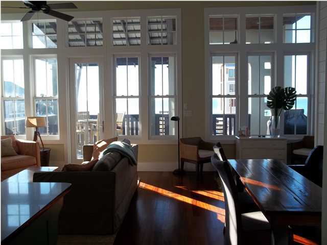 263 Winston Lane Inlet Beach, FL 32461 - Photo 3 of 21 a living room with furniture and floor to ceiling windows