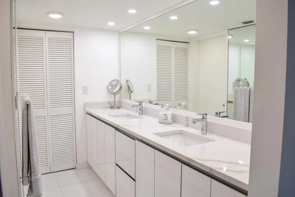 a bathroom with a shower and a toilet