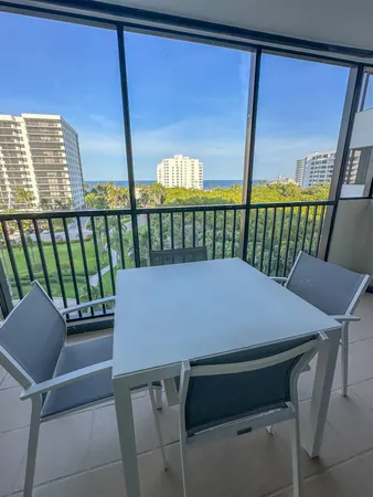 a front view of a building with a yard