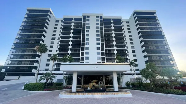 a outdoor living space with furniture and a potted plant