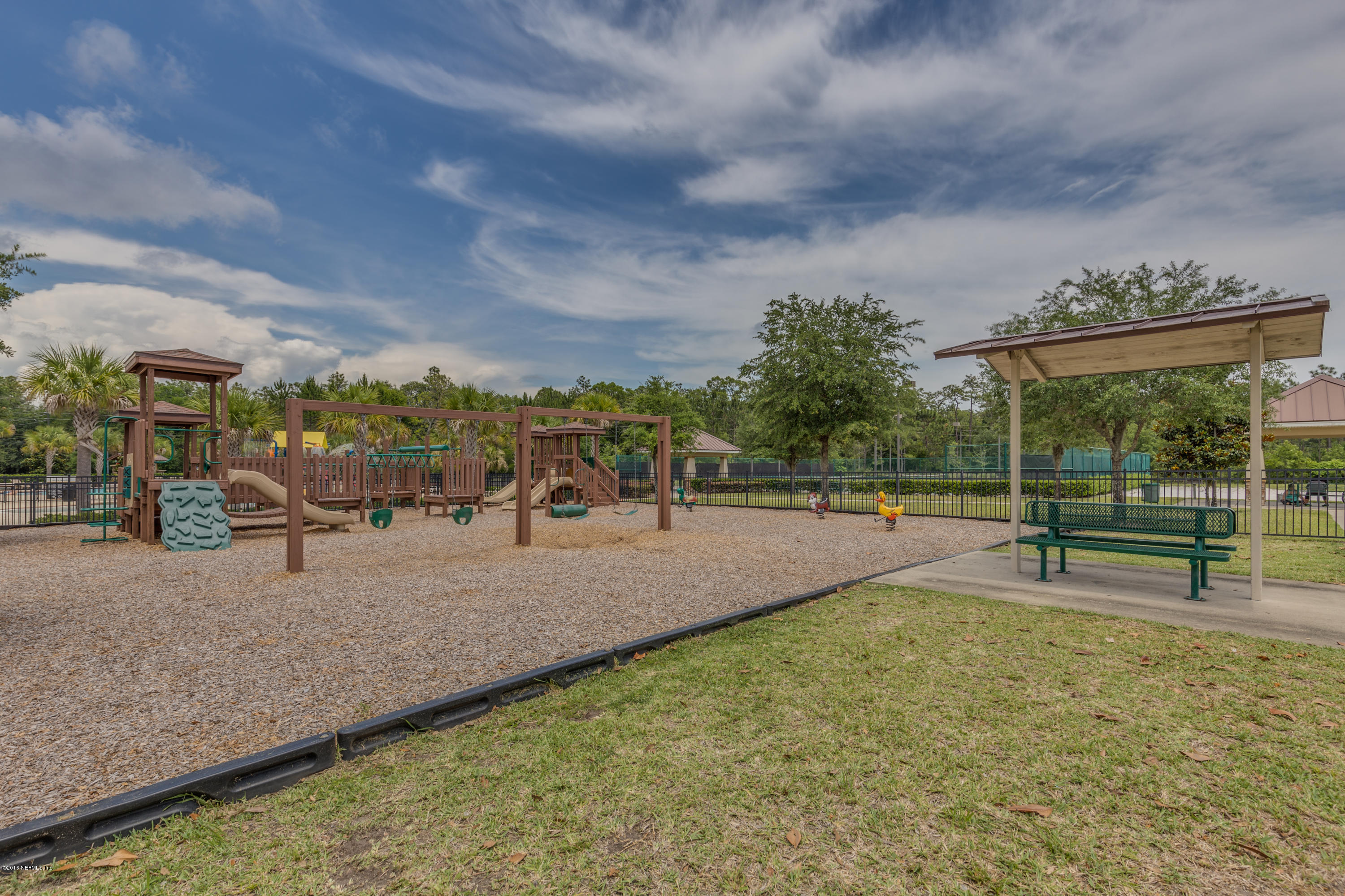 16409 Tisons Bluff Road Jacksonville, FL 32218 - Photo 35 of 42 swimming pool view with a garden space