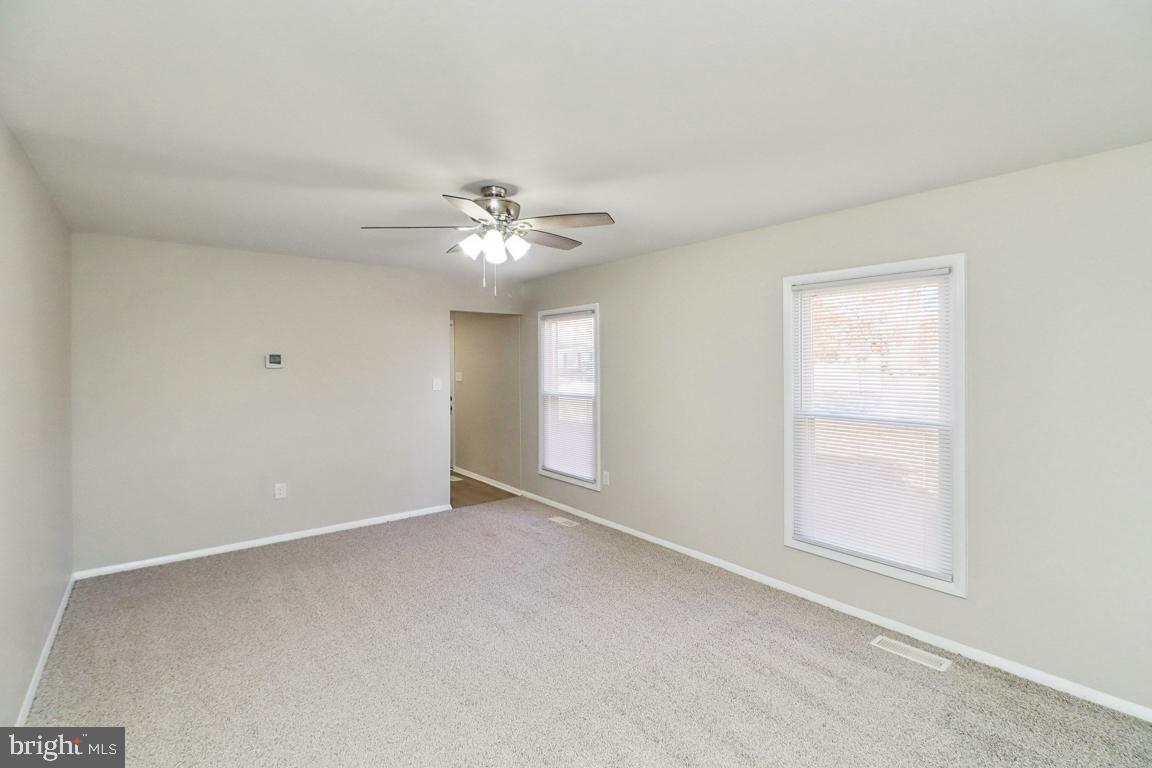 6551 Cornell Road Bryans Road, MD 20616 - Photo 11 of 25 a view of an empty room with chandelier fan