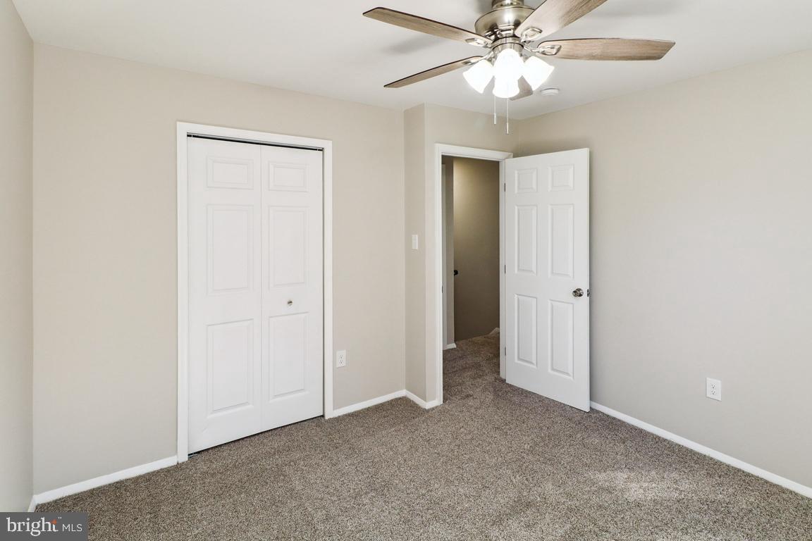 6551 Cornell Road Bryans Road, MD 20616 - Photo 17 of 25 a view of an empty room and chandelier fan