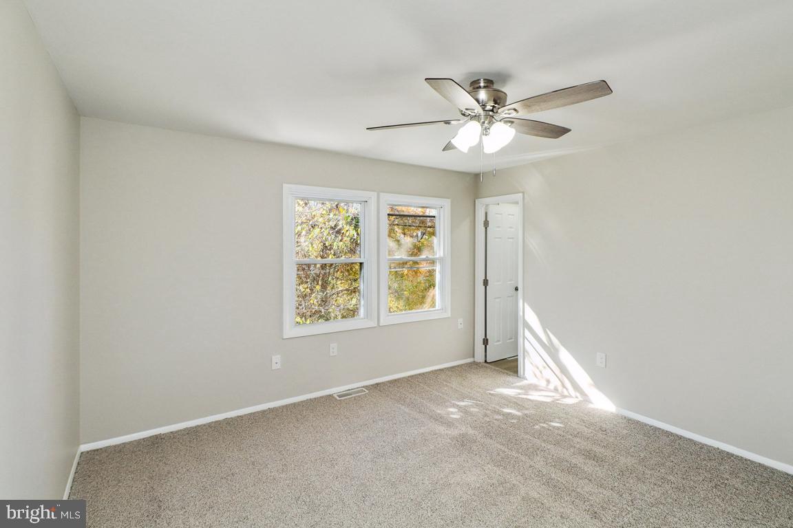 6551 Cornell Road Bryans Road, MD 20616 - Photo 21 of 25 a view of an empty room with a window