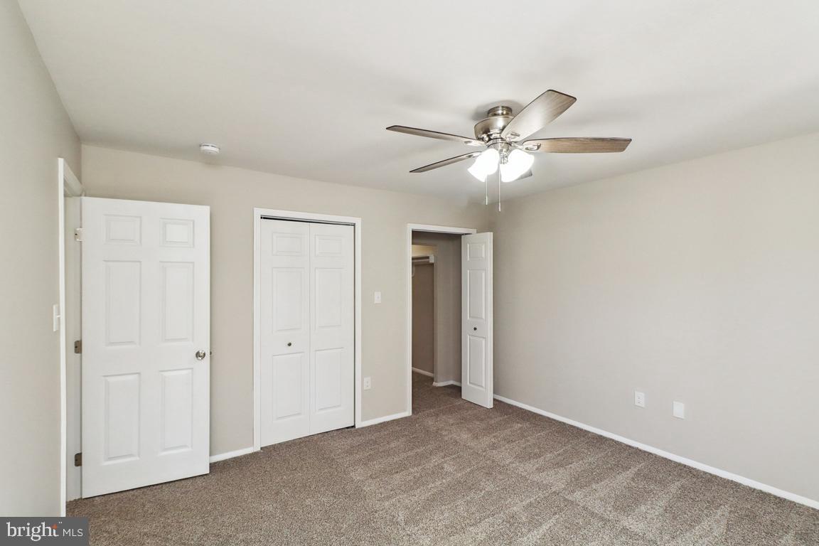 6551 Cornell Road Bryans Road, MD 20616 - Photo 22 of 25 a view of an empty room with a ceiling fan