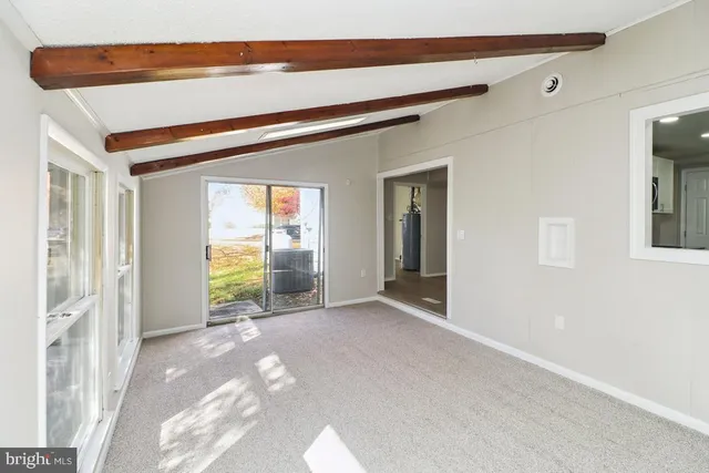 a view of a room with a swimming pool