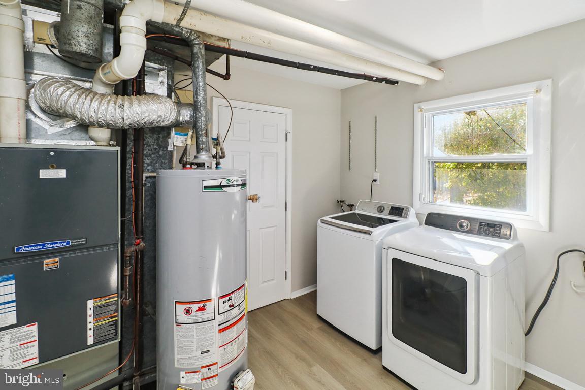 6551 Cornell Road Bryans Road, MD 20616 - Photo 10 of 25 a utility room with dryer and washer