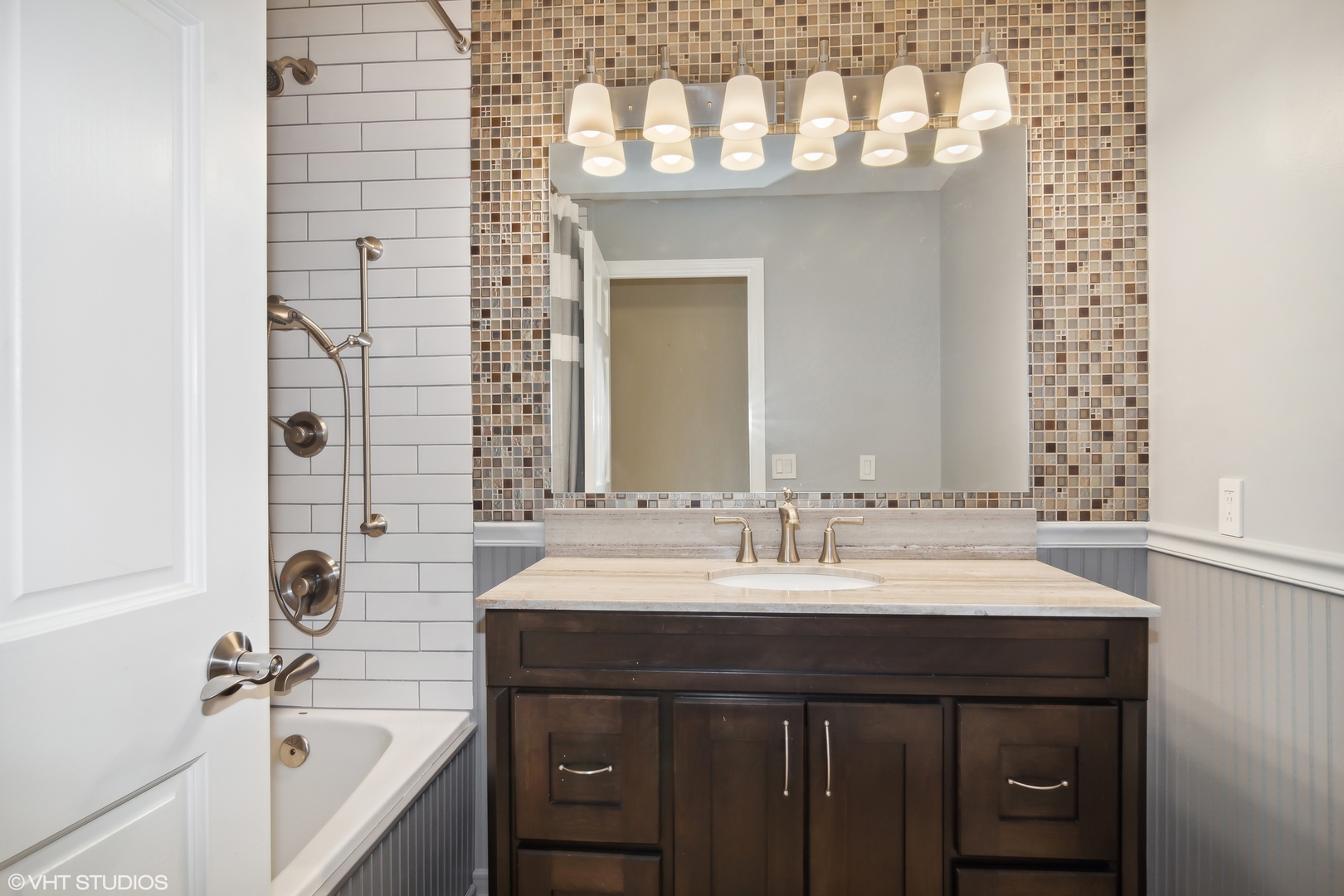 1875 Alschuler Drive Aurora, IL 60506 - Photo 12 of 16 a bathroom with a sink and a mirror