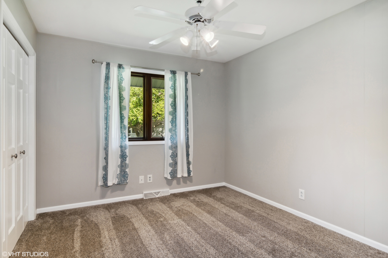 1875 Alschuler Drive Aurora, IL 60506 - Photo 10 of 16 wooden floor in an empty room with a window