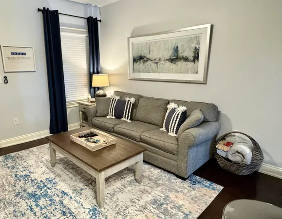 $329,000 | 114 Carillon Market Street, Unit 201, Panama City Beach, FL 32413