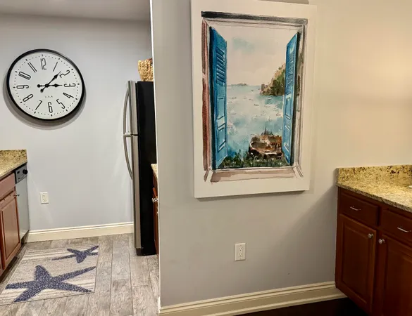 $329,000 | 114 Carillon Market Street, Unit 201, Panama City Beach, FL 32413