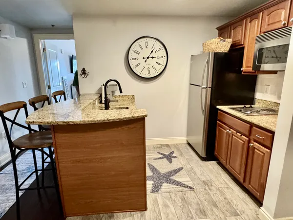 $329,000 | 114 Carillon Market Street, Unit 201, Panama City Beach, FL 32413