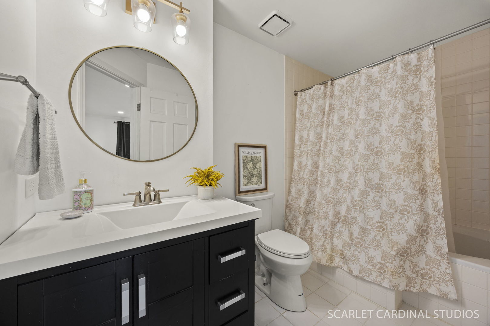 528 Pershing Avenue, Unit G Glen Ellyn, IL 60137 - Photo 9 of 14 a bathroom with a sink vanity mirror and toilet