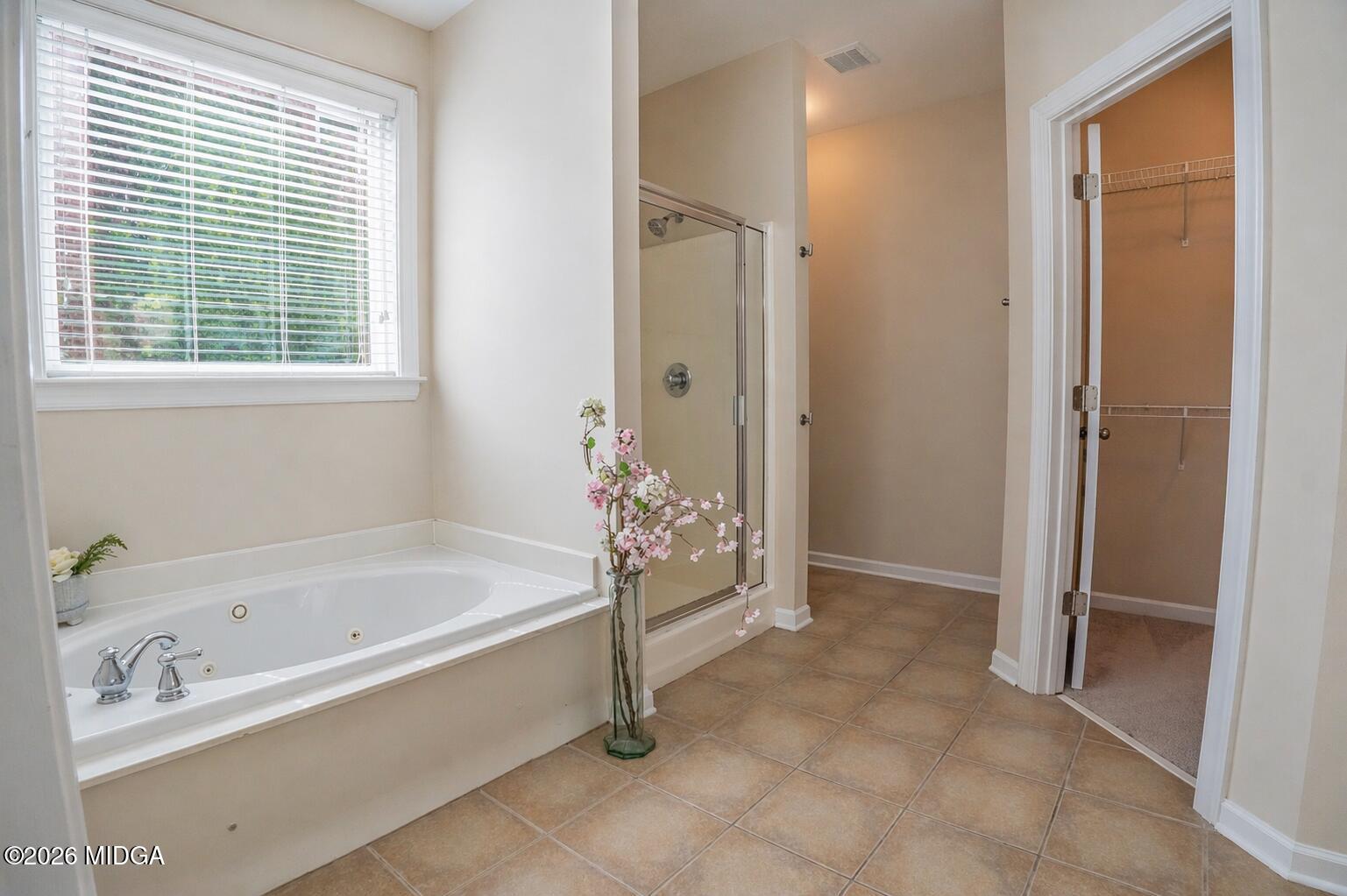 339 Fairways Drive Macon, GA 31220 - Photo 24 of 37 a bathroom with a bathtub and a shower