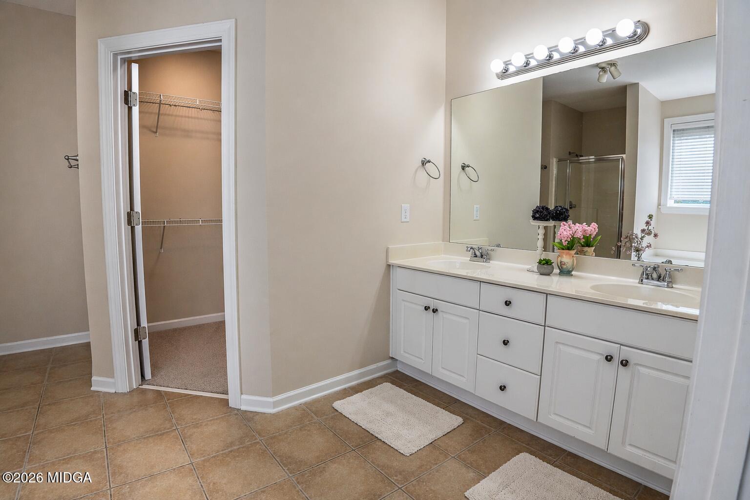 339 Fairways Drive Macon, GA 31220 - Photo 25 of 37 a bathroom with a double vanity sink and mirror