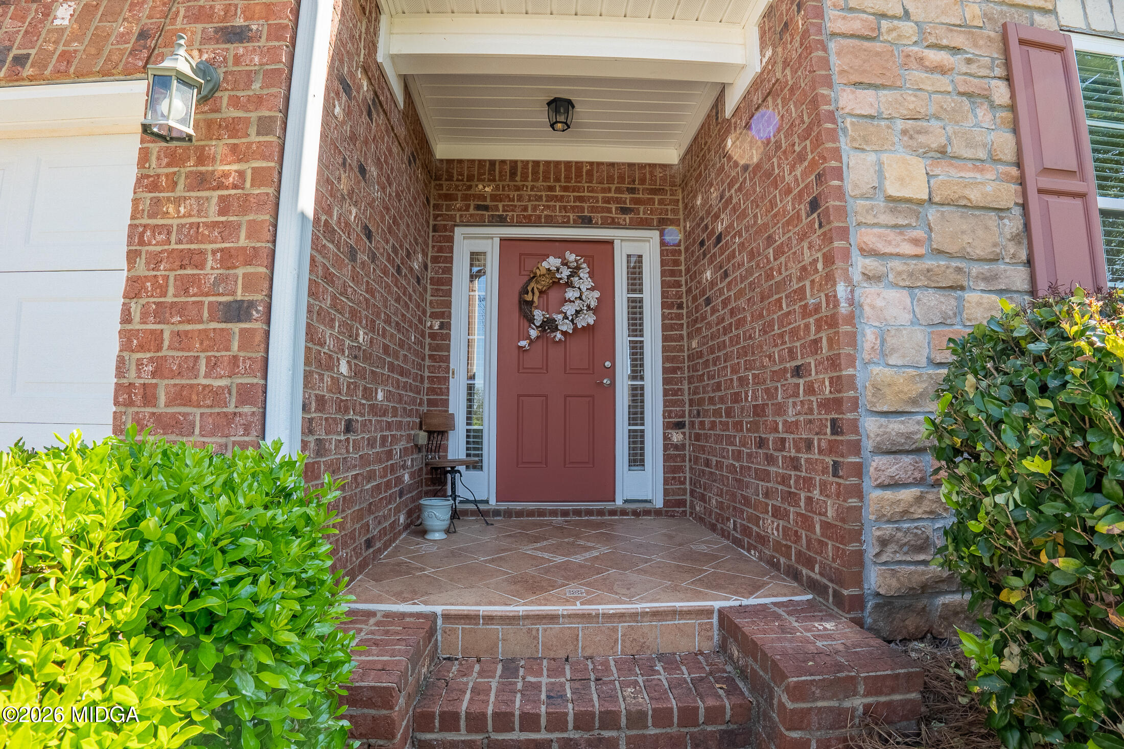 339 Fairways Drive Macon, GA 31220 - Photo 4 of 37 a front view of a building with a garden