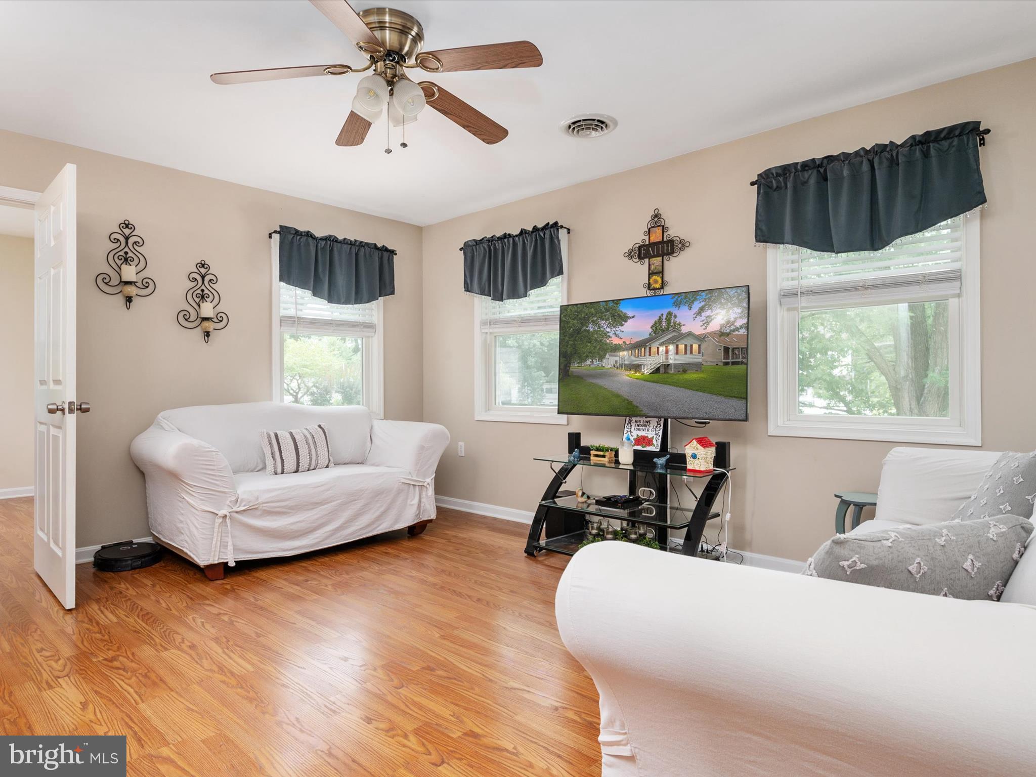 113 Radcliffe Road Grasonville, MD 21638 - Photo 12 of 30 a living room with furniture and a large window