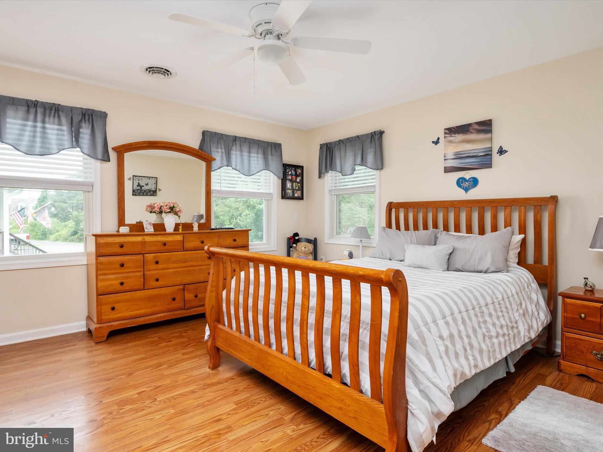 113 Radcliffe Road Grasonville, MD 21638 - Photo 14 of 30 a bedroom with a bed and a window