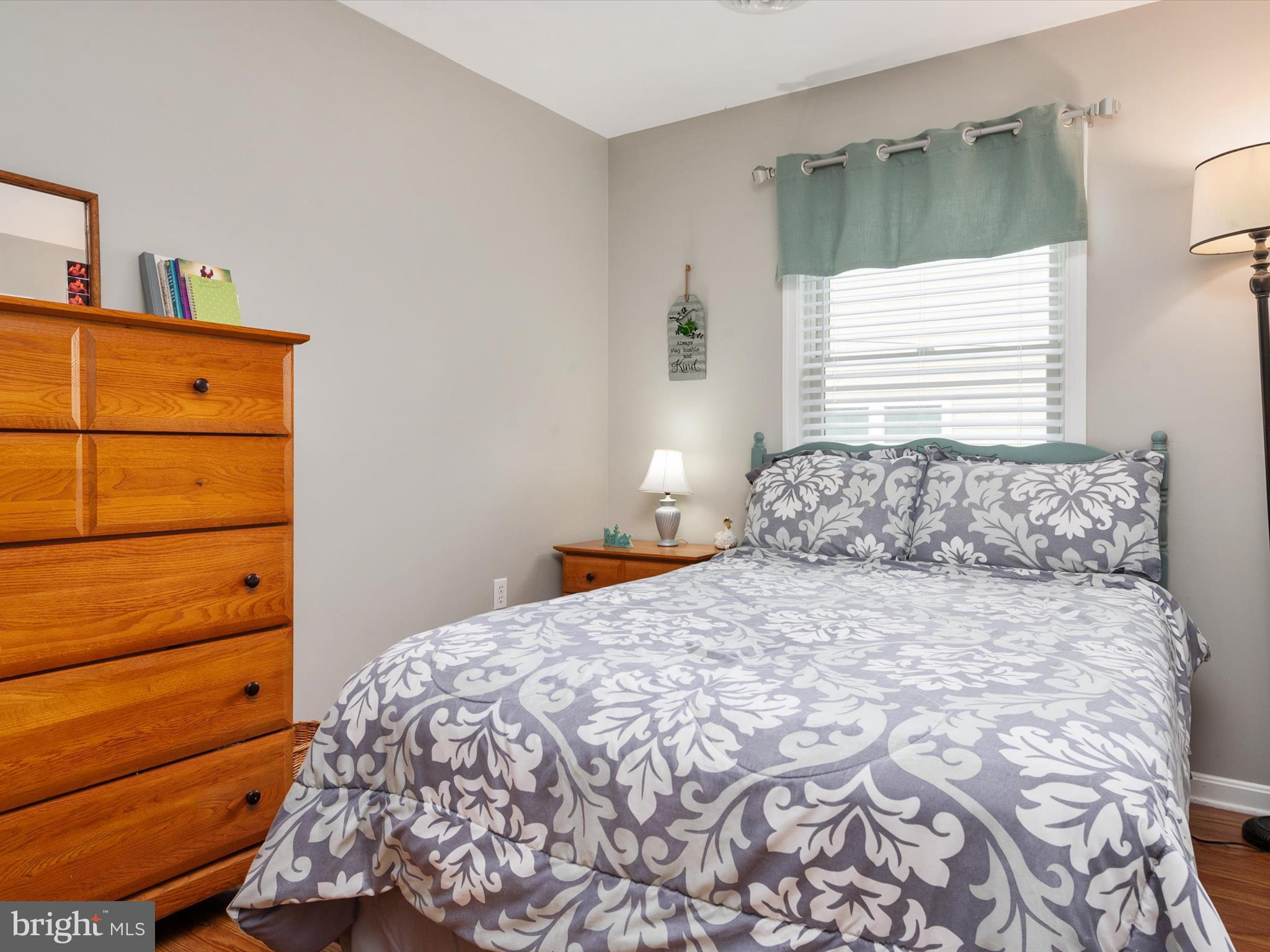 113 Radcliffe Road Grasonville, MD 21638 - Photo 18 of 30 a bedroom with a bed and a window