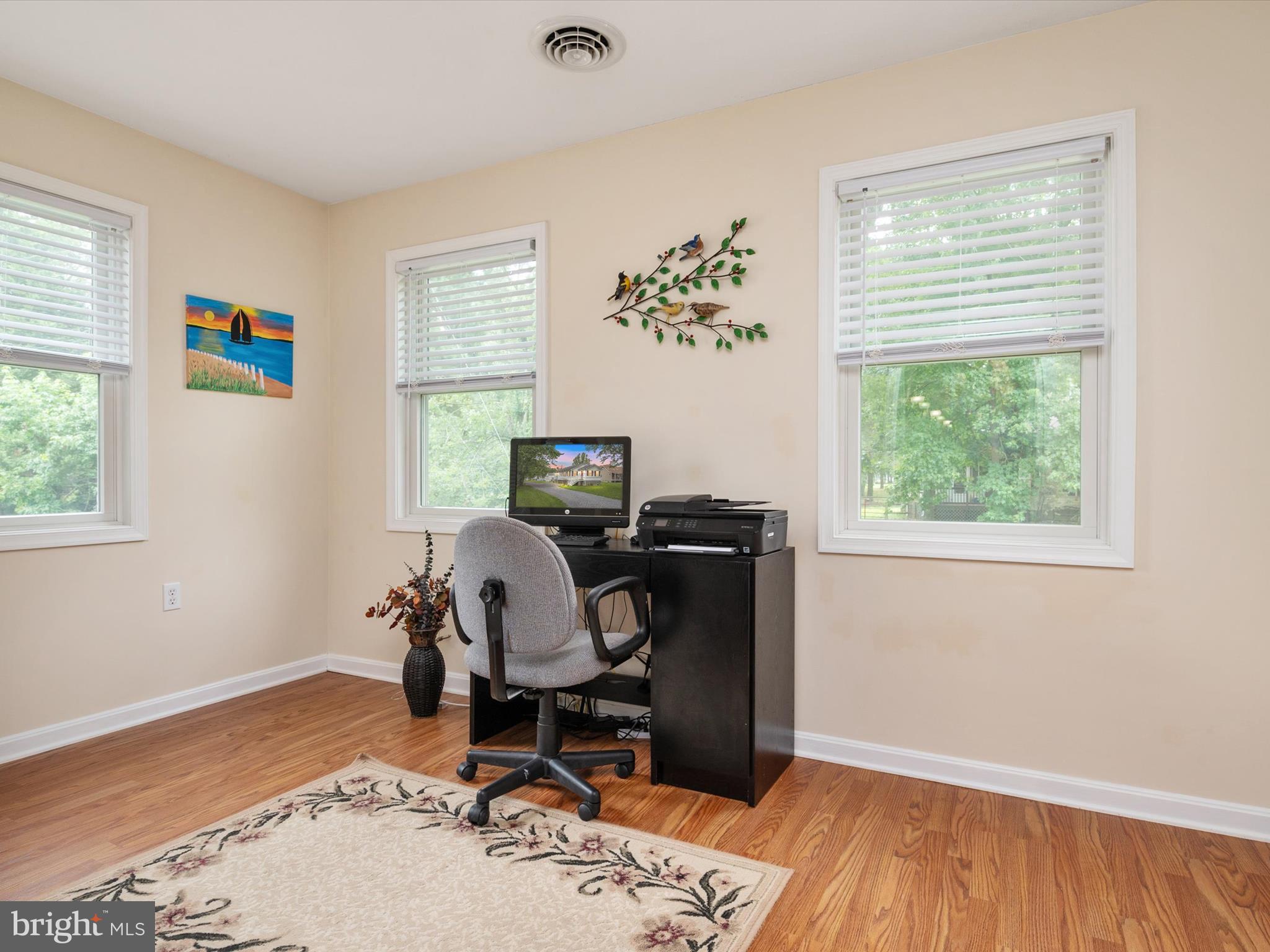 113 Radcliffe Road Grasonville, MD 21638 - Photo 20 of 30 a view of workspace with wooden floor windows