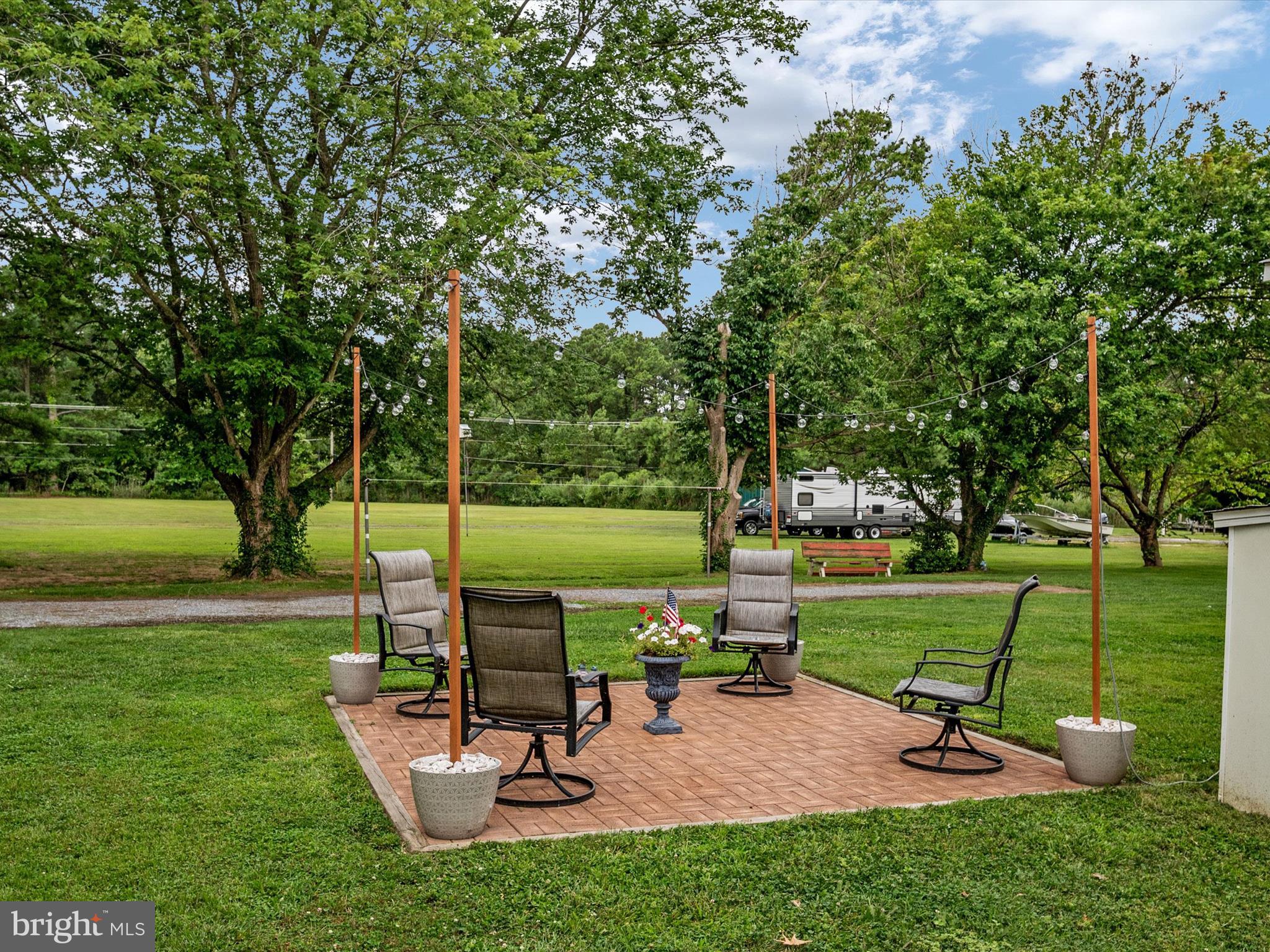 113 Radcliffe Road Grasonville, MD 21638 - Photo 22 of 30 a view of a park with swings