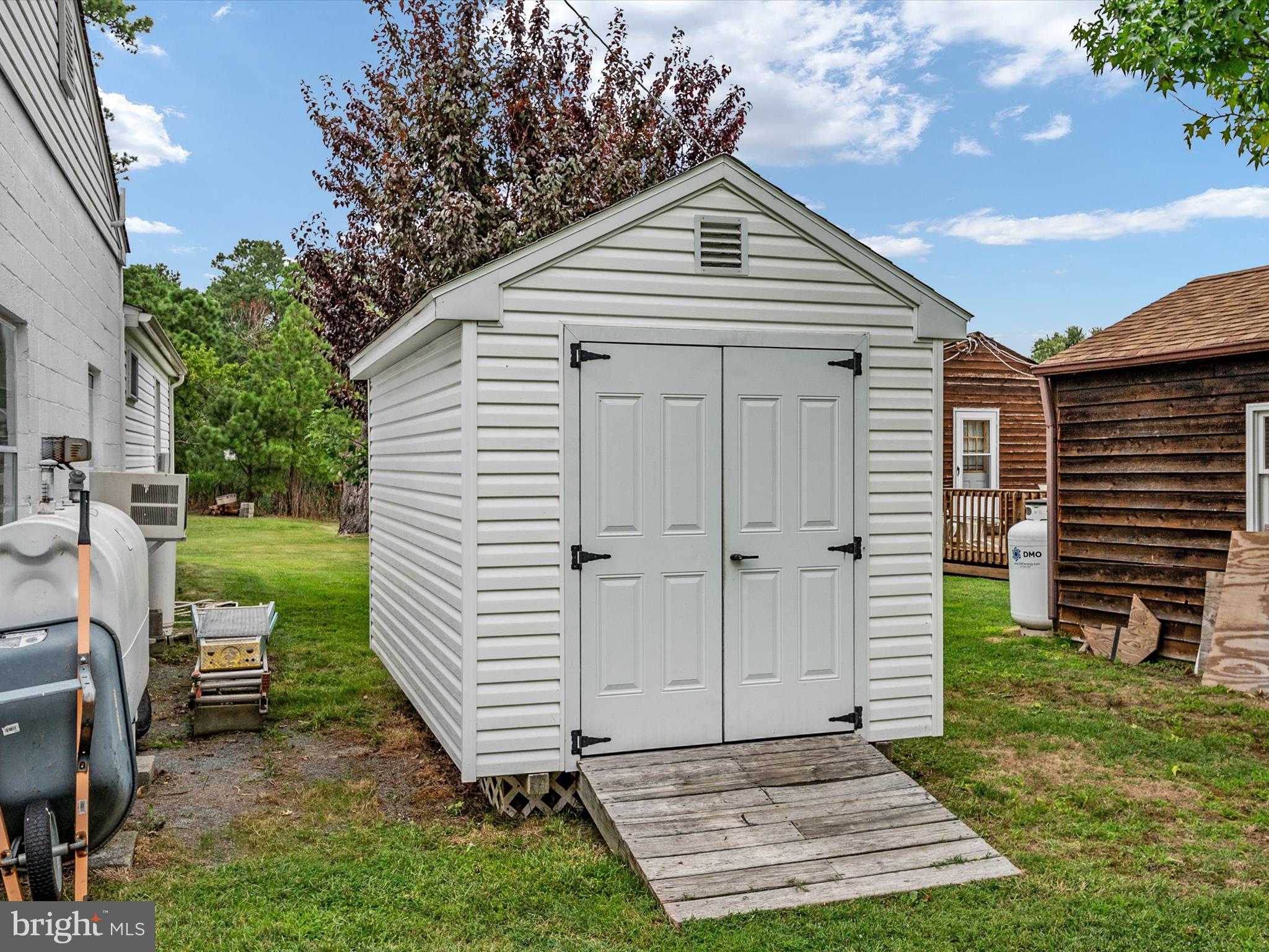 113 Radcliffe Road Grasonville, MD 21638 - Photo 26 of 30 a front view of a house with a yard
