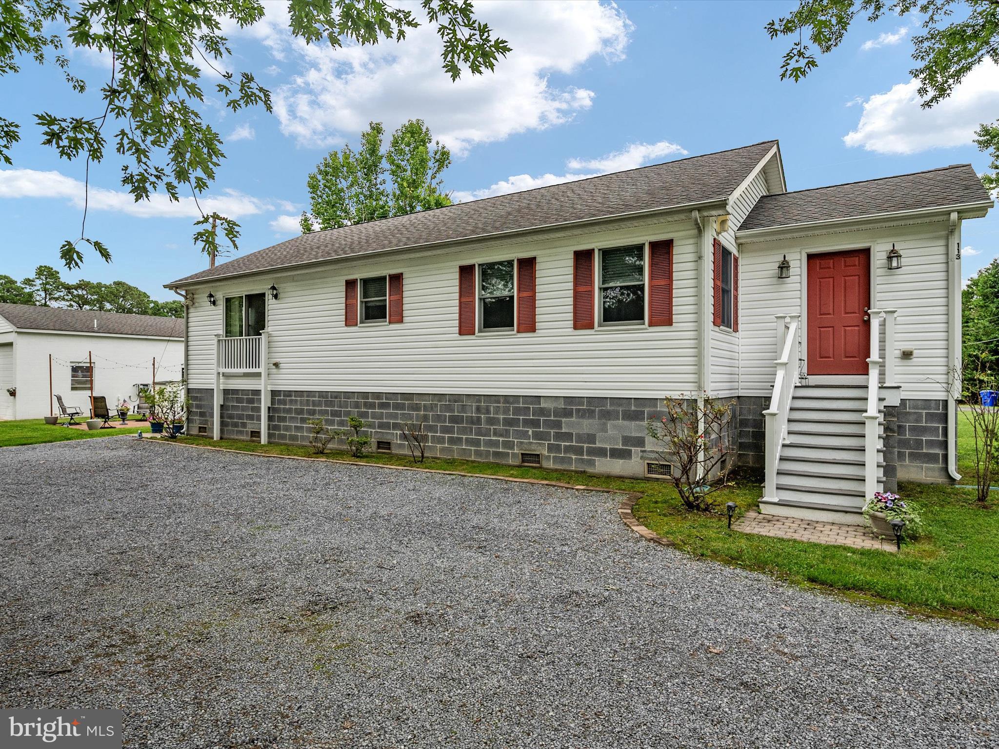 113 Radcliffe Road Grasonville, MD 21638 - Photo 30 of 30 a view of a house with a yard