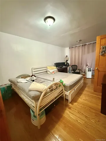 a spacious bathroom with a double vanity and a mirror