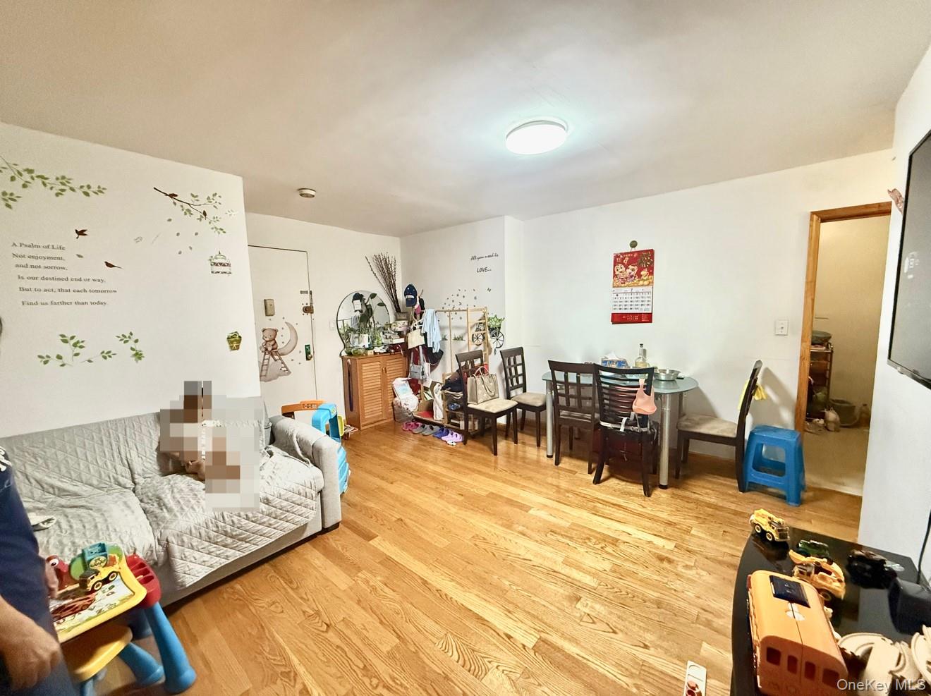 138-70 Elder Avenue, Unit 3A Queens, NY 11355 - Photo 7 of 10 a living room with furniture