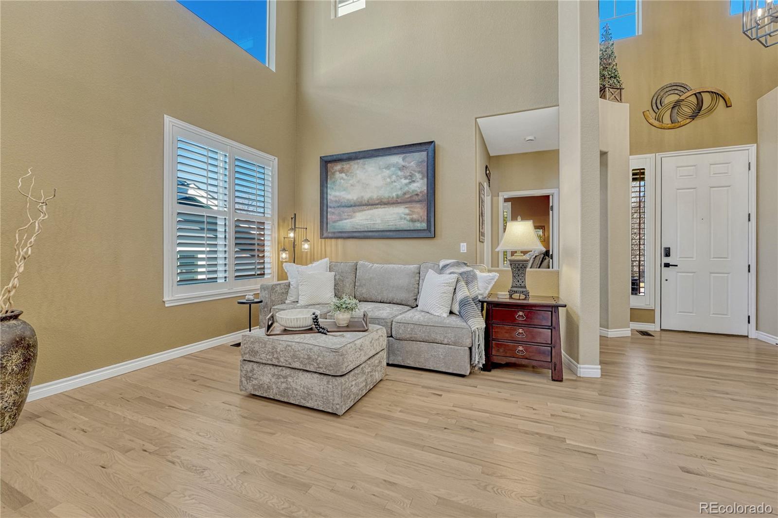 10761 Glengate Circle Highlands Ranch, CO 80130 - Photo 11 of 39 a living room with furniture and window