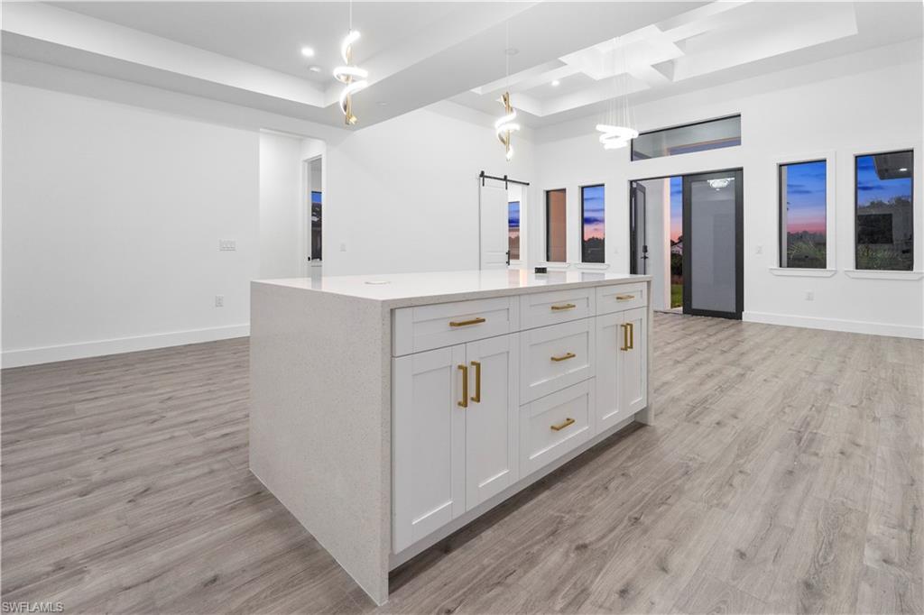 2714 24th Street West Lehigh Acres, FL 33971 - Photo 14 of 48 a bathroom with a double vanity sink and a mirror