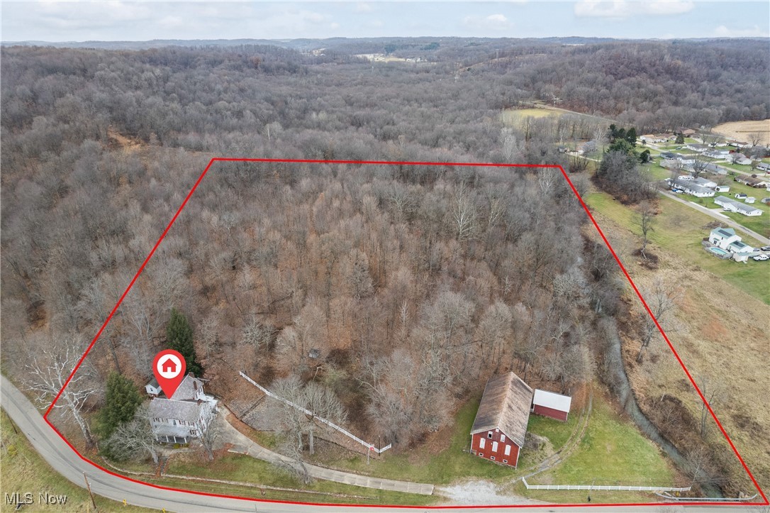 5147 Bluebird Road Northwest Malvern, OH 44644 - Photo 2 of 26 Aerial view of home and barn structure - 8.331 acres