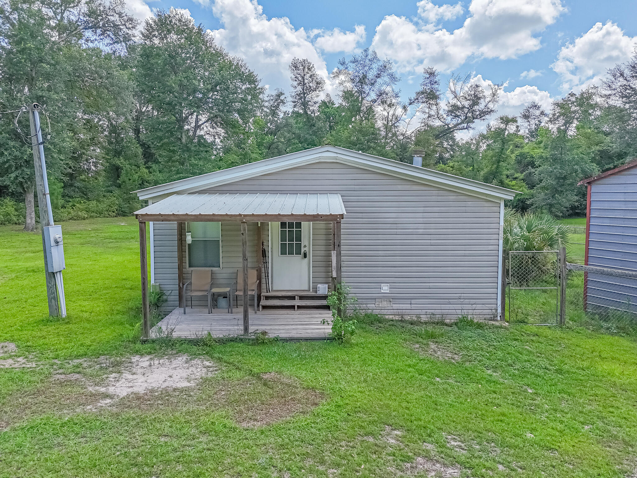 2214 Mill Road Cottondale, FL 32431 - Photo 3 of 45 DJI_20250630103304_0721_D