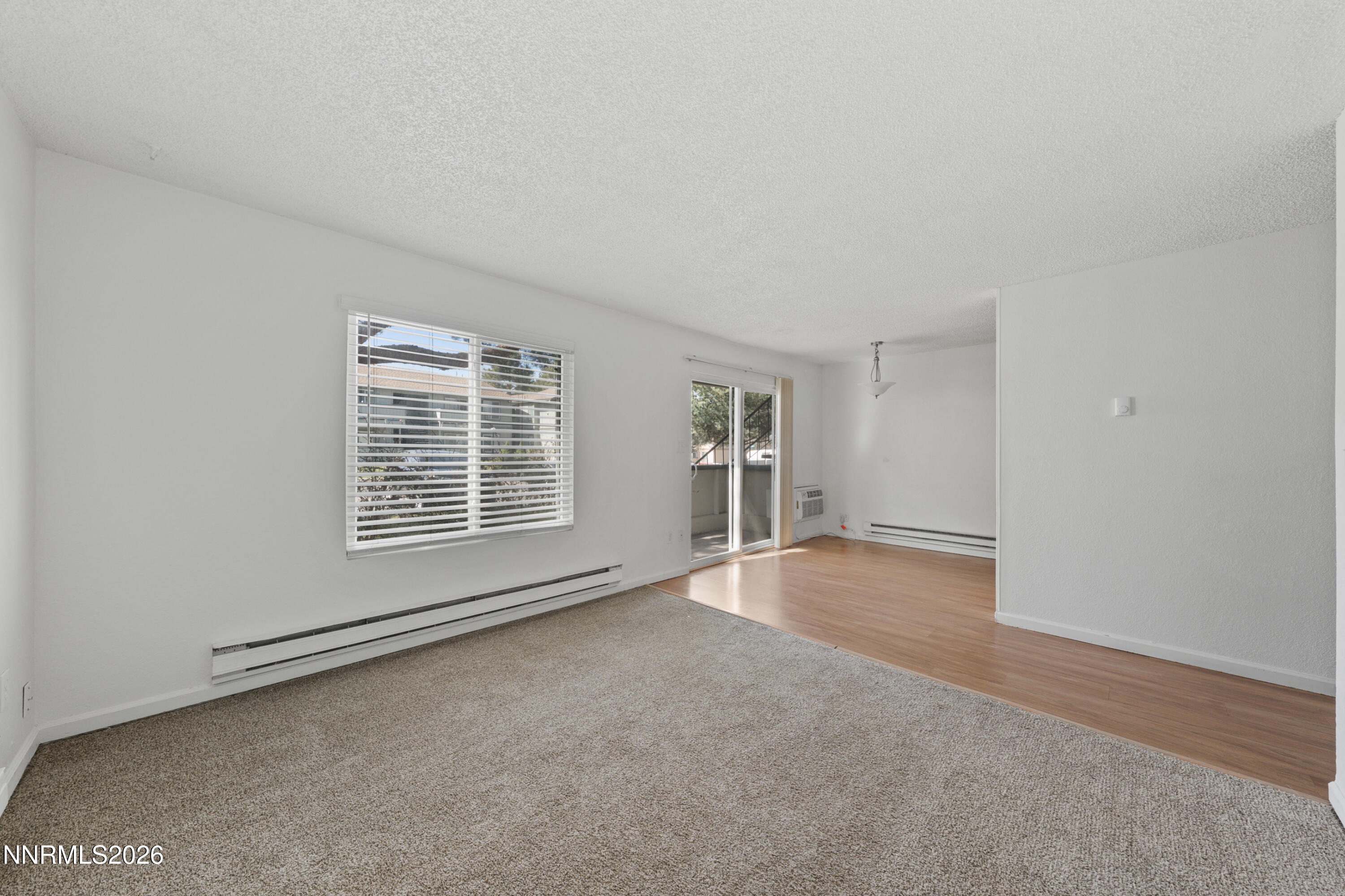 3942 Clear Acre Lane, Unit 241 Reno, NV 89512 - Photo 12 of 23 a view of an empty room with a window