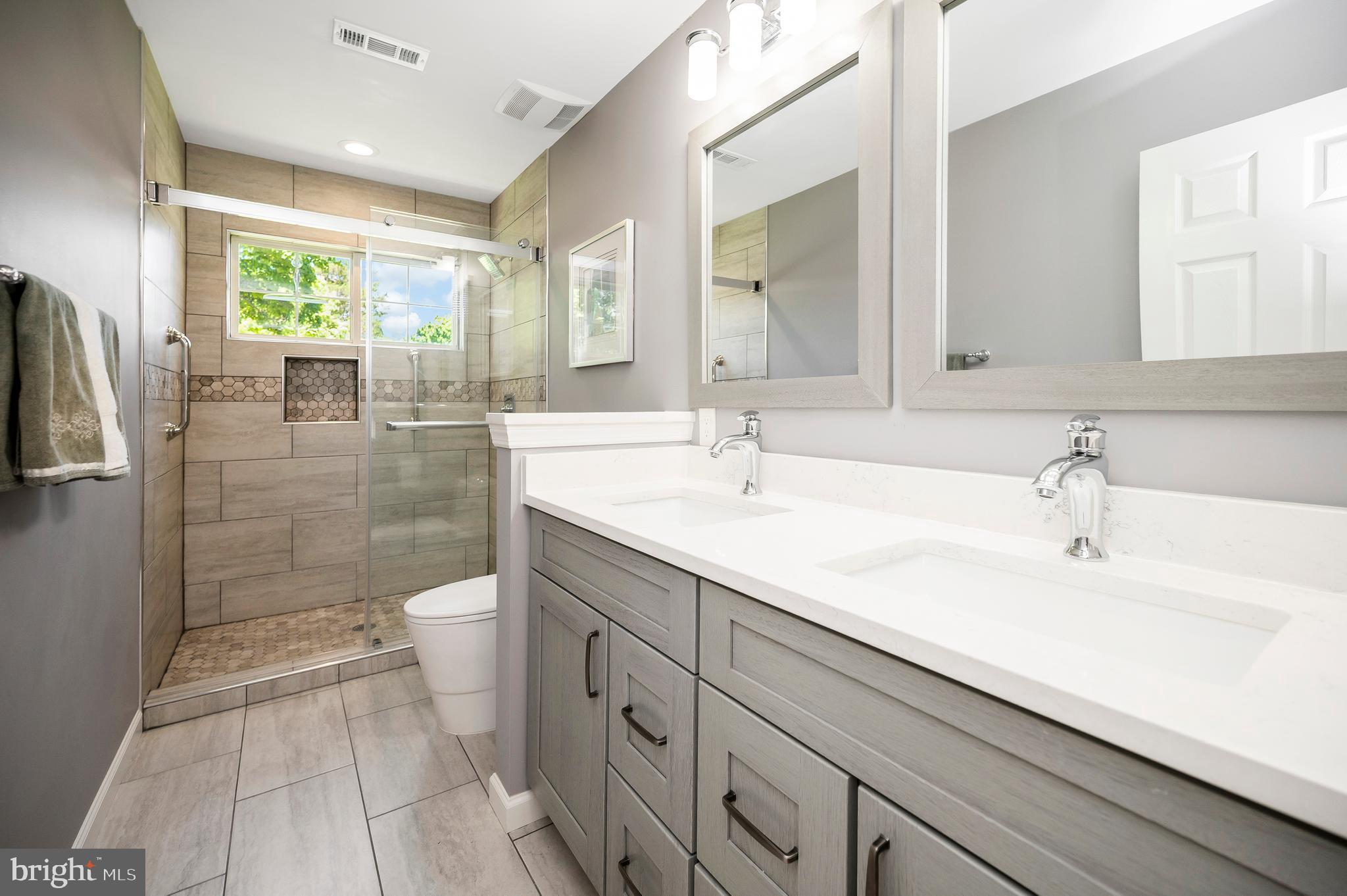 110 Lee Circle Locust Grove, VA 22508 - Photo 38 of 67 Hall bath boasts double sinks and walk-in shower