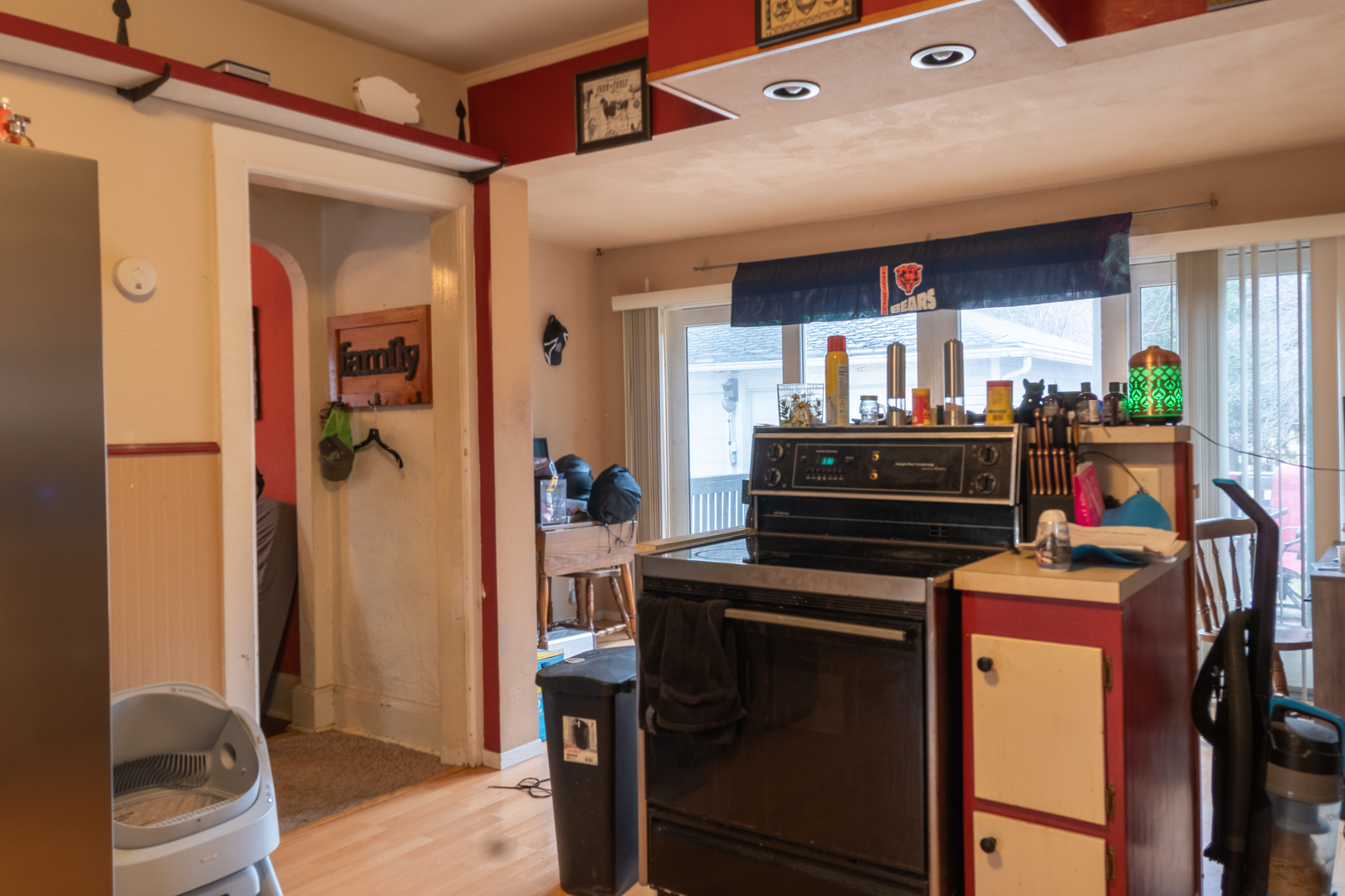 223 West Avon Street Freeport, IL 61032 - Photo 13 of 14 a kitchen with stainless steel appliances a stove and a refrigerator
